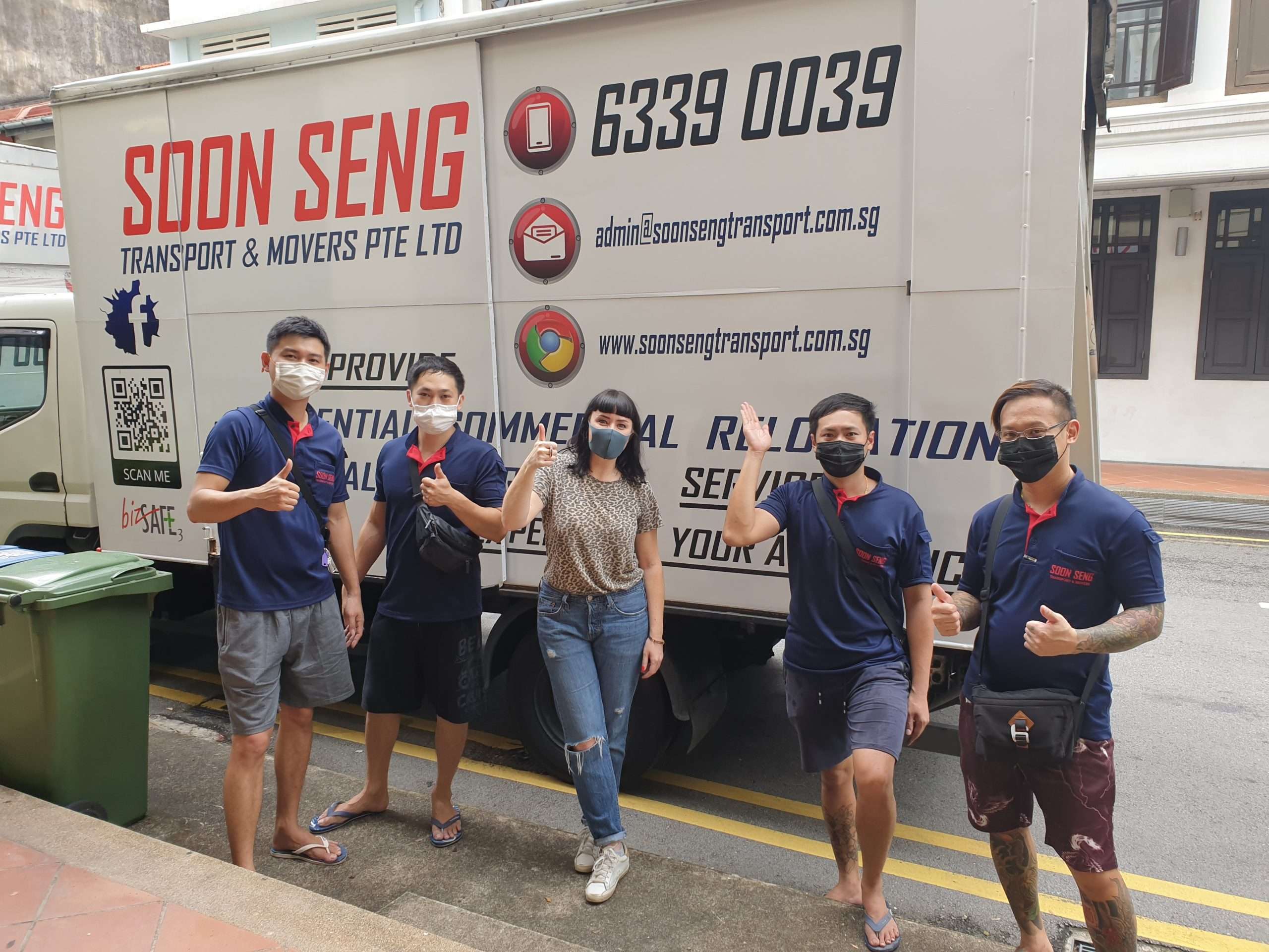 photo with girl client in front company van