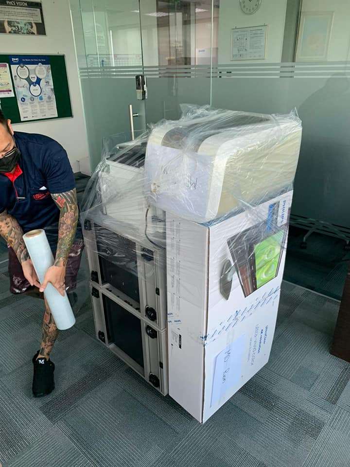 staff bundle ups and wraps office equipment