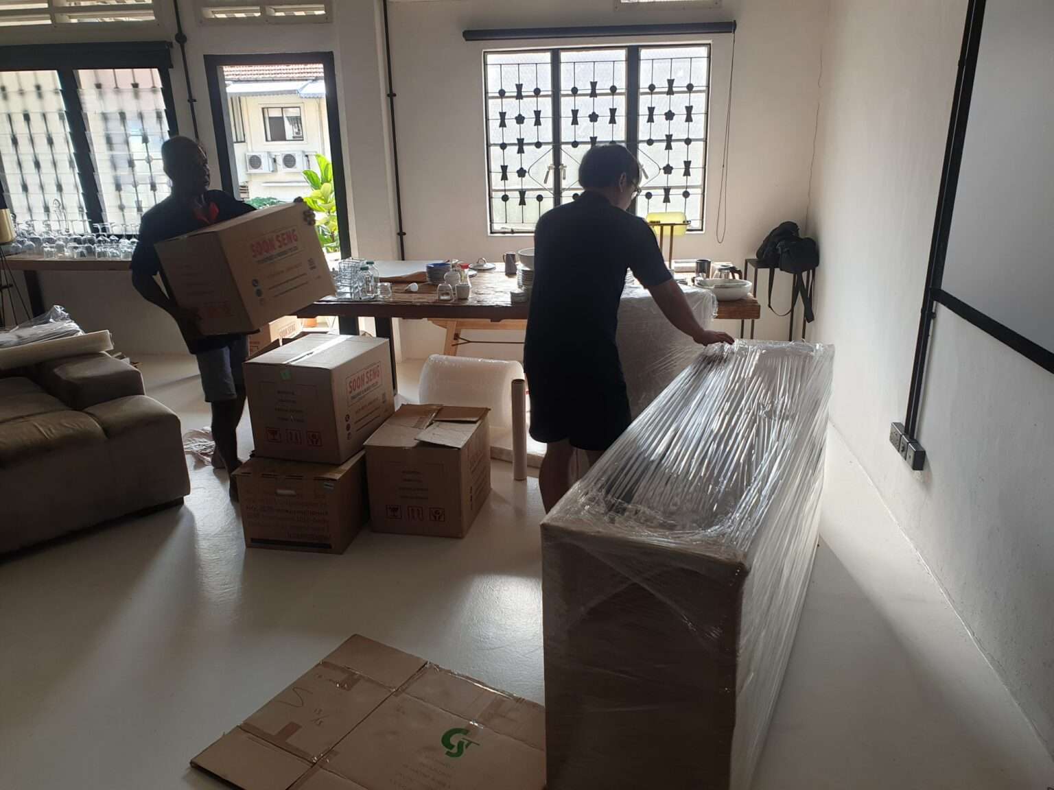 arranging furniture after moving to new home