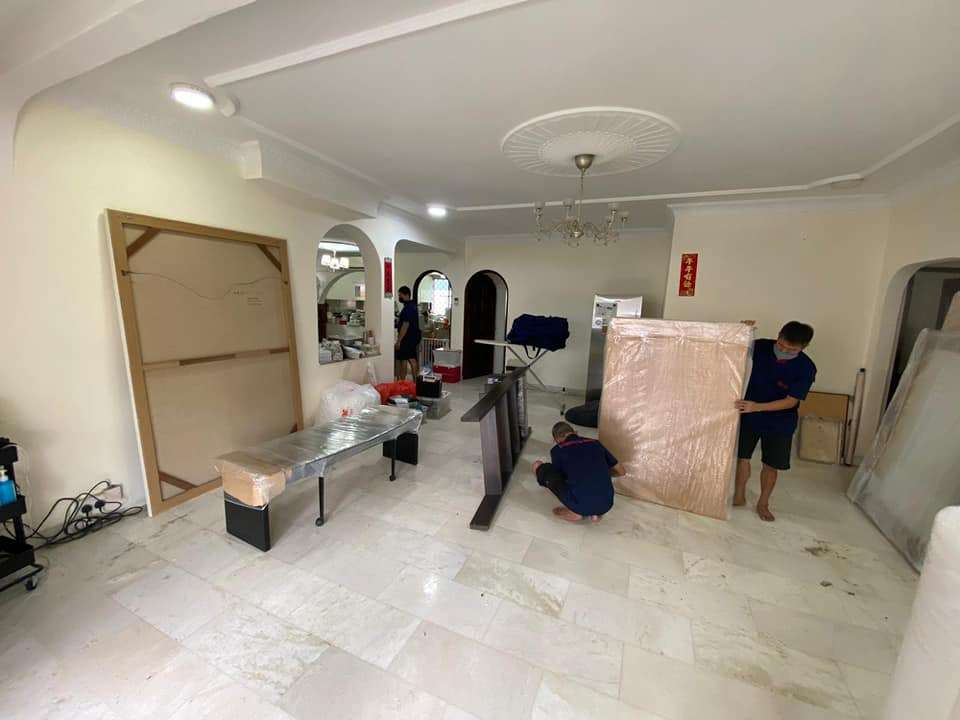 progression of home moving as staff are preparing to pack the mattress