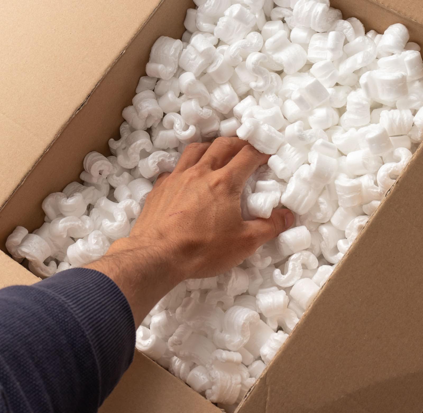 box filled with foam packing peanuts box filled with foam packing peanuts