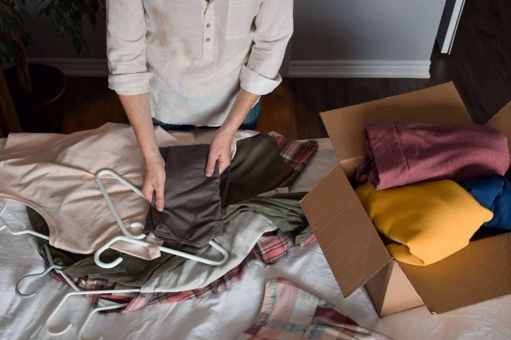 lady decluttering her clothing